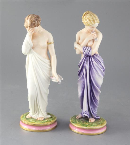 A pair of Royal Worcester Kerr & Binns figures of Sorrow and Joy, 25cm and 24cm